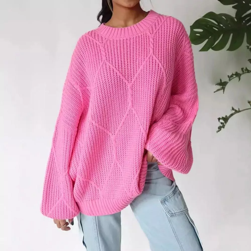 Maglione donna fucsia oversize a maglia con maniche a sbuffo e pantaloni chiari